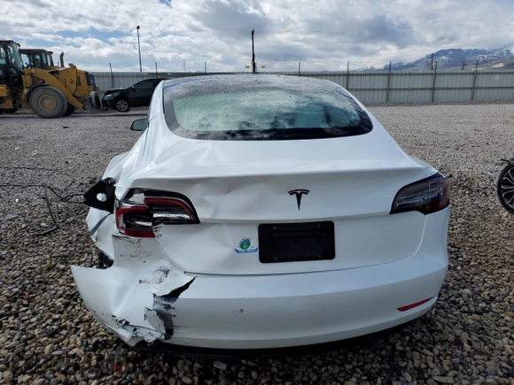 2023 Tesla Model 3 with VIN 5YJ3E1EA9PF569835, listed as a Copart auction lot 50876824 with 25,736 mi miles and Salvage Title. Bid and sale history available at DreamBid. Image 6.
