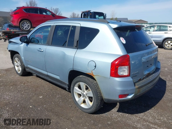 2013 Jeep Compass Latitude with VIN 1C4NJDEB2DD263920, listed as a IAAI auction lot 41832542 with 128,018 mi miles. Bid and sale history available at carsss.com. Image 3.