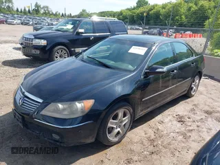 2006 Acura RL z VIN JH4KB16536C012211, wystawiony jako IAAI lot #42698313 z przebiegiem 229 622 mil mil oraz . Historia ofert i sprzedaży dostępna na DreamBid. Obrazek 2.