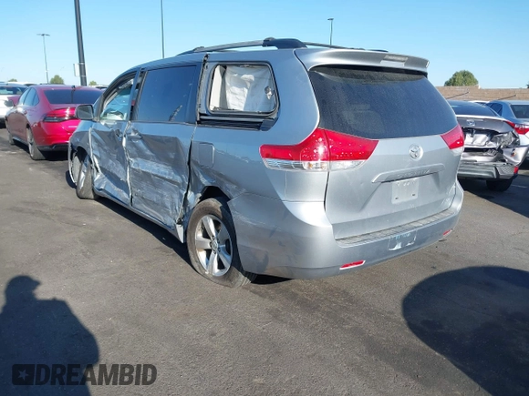 2014 Toyota Sienna LE AAS with VIN 5TDKK3DC7ES435109, listed as a IAAI auction lot 41963135 with 175,517 mi miles and . Bid and sale history available at DreamBid. Image 3.