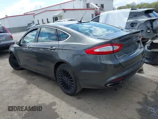 2015 Ford Fusion Titanium with VIN 3FA6P0K96FR283763, listed as a IAAI auction lot 42046868 with 104,542 mi miles. Bid and sale history available at carsss.com. Image 3.