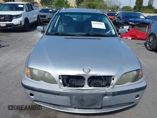 2002 BMW 3 Series 325i with VIN WBAET37492NG83135, listed as a IAAI auction lot 42028502 with 184,216 mi miles. Bid and sale history available at carsss.com. Image 12.