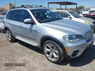 2012 BMW X5 35d with VIN 5UXZW0C58CL671141, listed as a IAAI auction lot 42644381 with 127,464 mi miles and . Bid and sale history available at DreamBid. Image 1.
