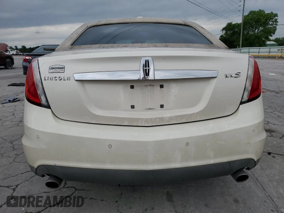 2009 Lincoln MKS with VIN 1LNHM93R89G603297, listed as a Copart auction lot 55474585 with 111,760 mi miles and Salvage title. Bid and sale history available at DreamBid. Image 6.
