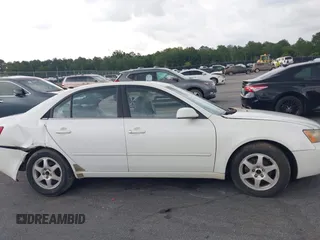 2006 Hyundai Sonata GLS z VIN KMHEU46C06A091417, wystawiony jako IAAI lot #42364241 z przebiegiem 131 054 mil mil oraz . Historia ofert i sprzedaży dostępna na DreamBid. Obrazek 13.