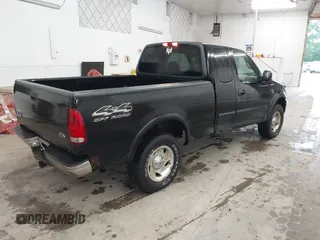 2000 Ford F-150 XL with VIN 1FTRX18W9YNB67215, listed as a IAAI auction lot 42558112 with 118,628 mi miles and . Bid and sale history available at DreamBid. Image 4.