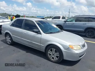 2002 Mazda Protege DX z VIN JM1BJ225220551012, wystawiony jako IAAI lot #42392802 z przebiegiem 203 770 mil mil oraz . Historia ofert i sprzedaży dostępna na DreamBid. Obrazek 1.
