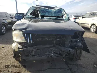 2005 Mercury Mariner Luxury z VIN 4M2CU57185DJ15517, wystawiony jako Copart lot #44415385 z przebiegiem 129 177 mil mil oraz Szkody całkowita. Historia ofert i sprzedaży dostępna na DreamBid. Obrazek 5.