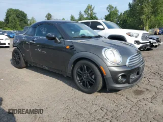 2012 MINI Coupe z VIN WMWSX1C57CT163911, wystawiony jako Copart lot #65001404 z przebiegiem 101 939 mil mil oraz Szkody całkowita. Historia ofert i sprzedaży dostępna na DreamBid. Obrazek 4.