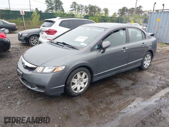 2010 Honda Civic LX with VIN 2HGFA1F59AH326233, listed as a IAAI auction lot 42190935 with 61,378 mi miles and . Bid and sale history available at DreamBid. Image 2.