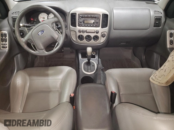 2005 Ford Escape XLT z VIN 1FMYU93145KA20050, wystawiony jako Copart lot #76794024 z przebiegiem 98 559 mil mil oraz Szkoda całkowita • Salvage title. Historia ofert i sprzedaży dostępna na DreamBid. Obrazek 8.