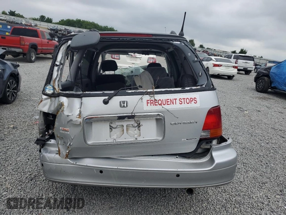1997 Honda Odyssey z VIN RA21211409, wystawiony jako Copart lot #62449015 z przebiegiem Nie podano mil oraz Szkoda całkowita • Salvage title. Historia ofert i sprzedaży dostępna na DreamBid. Obrazek 6.