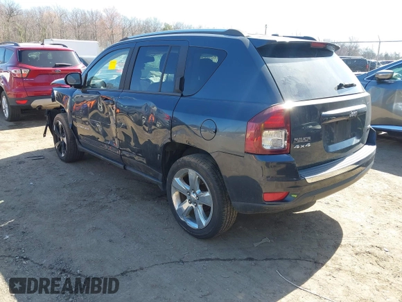2014 Jeep Compass Limited with VIN 1C4NJDCB5ED700913, listed as a IAAI auction lot 41821956 with 175,312 mi miles. Bid and sale history available at carsss.com. Image 3.