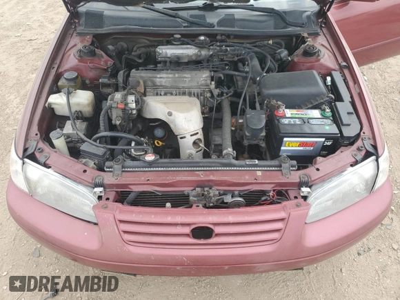 1998 Toyota Camry LE z VIN JT2BG22K6W0179063, wystawiony jako Copart lot #56998295 z przebiegiem 251 129 mil mil oraz Szkoda całkowita • Salvage title. Historia ofert i sprzedaży dostępna na DreamBid. Obrazek 11.