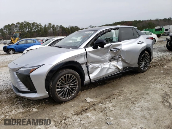 2023 Lexus RZ 450e Premium z VIN JTJAAAAB7PA005835, wystawiony jako Copart lot #42201414 z przebiegiem 2 144 mil mil oraz . Historia ofert i sprzedaży dostępna na DreamBid. Obrazek 1.