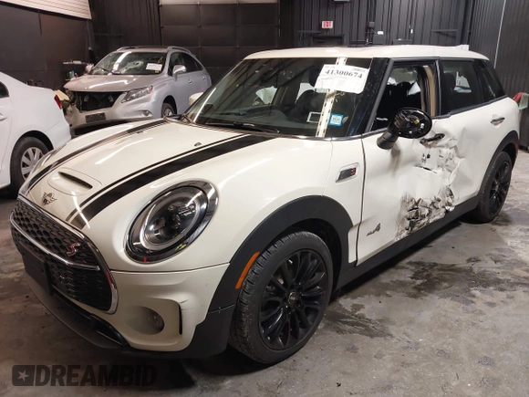 2023 MINI Clubman Cooper S with VIN WMWXJ1C02P2S77645, listed as a IAAI auction lot 41300674 with 34,302 mi miles. Bid and sale history available at carsss.com. Image 18.