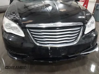 2014 Chrysler 200 Touring with VIN 1C3CCBBB3EN198117, listed as a IAAI auction lot 41999090 with 144,257 mi miles. Bid and sale history available at carsss.com. Image 19.