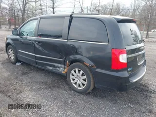 2011 Chrysler Town & Country Touring L with VIN 2A4RR8DG7BR641782, listed as a IAAI auction lot 42042025 with 141,884 mi miles and . Bid and sale history available at DreamBid. Image 3.