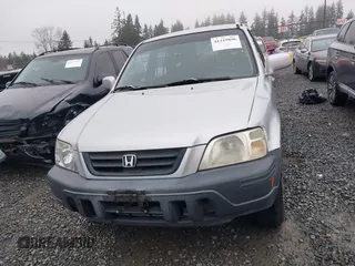 1999 Honda CR-V EX with VIN JHLRD1866XC033865, listed as a IAAI auction lot 41219896 with 142,396 mi miles. Bid and sale history available at carsss.com. Image 12.