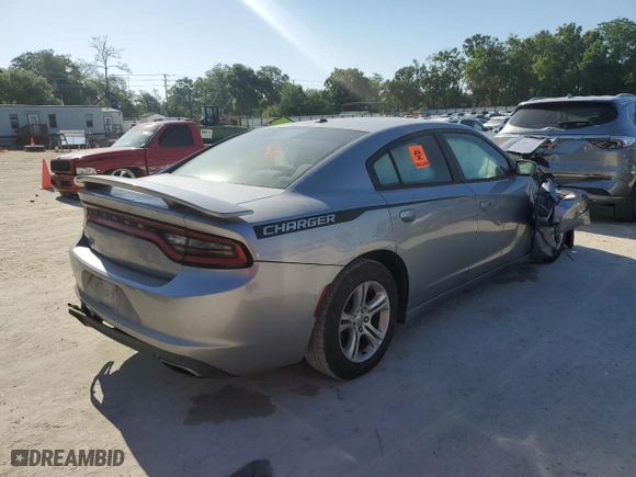 2015 Dodge Charger SE with VIN 2C3CDXBG8FH744720, listed as a Copart auction lot 52692595 with 142,950 mi miles and Clean Title. Bid and sale history available at carsss.com. Image 3.