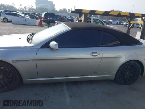 2006 BMW 6 Series 650Ci z VIN WBAEK13486CN72278, wystawiony jako IAAI lot #41119321 z przebiegiem 170 553 mil mil oraz . Historia ofert i sprzedaży dostępna na DreamBid. Obrazek 14.