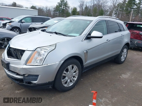 2014 Cadillac SRX Luxury Collection z VIN 3GYFNEE33ES670356, wystawiony jako IAAI lot #42008087 z przebiegiem 59 953 mil mil oraz . Historia ofert i sprzedaży dostępna na DreamBid. Obrazek 2.