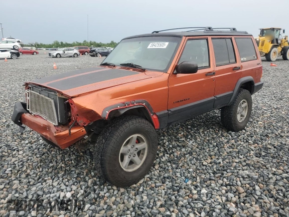 1999 Jeep Cherokee Sport with VIN 1J4FF68S7XL560943, listed as a Copart auction lot 58425505 with 68,654 mi miles and Salvage title. Bid and sale history available at DreamBid. Image 1.