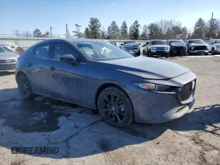 2023 Mazda 3 S Carbon Edition with VIN JM1BPBLM3P1616343, listed as a Copart auction lot 42303815 with 19,557 mi miles and Salvage title. Bid and sale history available at DreamBid. Image 4.