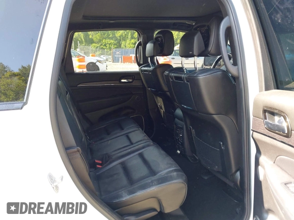 2021 Jeep Grand Cherokee Overland with VIN 1C4RJFCG3MC502165, listed as a IAAI auction lot 42404863 with 100,197 mi miles and . Bid and sale history available at DreamBid. Image 8.
