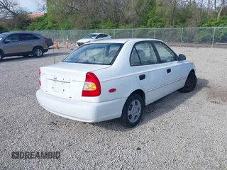 2002 Hyundai Accent GL with VIN KMHCG45C92U347708, listed as a IAAI auction lot 42137086 with 73,271 mi miles. Bid and sale history available at carsss.com. Image 4.