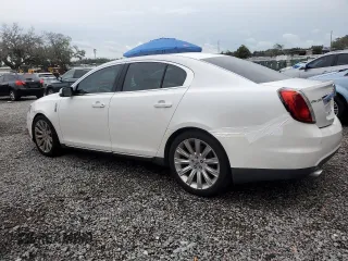 2011 Lincoln MKS z VIN 1LNHL9DRXBG609478, wystawiony jako Copart lot #57226135 z przebiegiem 178 372 mil mil oraz Szkoda całkowita • Salvage title. Historia ofert i sprzedaży dostępna na DreamBid. Obrazek 2.