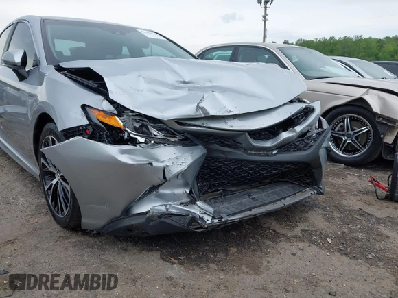 2018 Toyota Camry LE z VIN 4T1B11HK3JU129549, wystawiony jako IAAI lot #42159243 z przebiegiem 76 299 mil mil oraz . Historia ofert i sprzedaży dostępna na DreamBid. Obrazek 18.