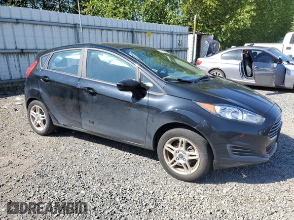 2019 Ford Fiesta SE with VIN 3FADP4EJXKM120349, listed as a Copart auction lot 54972535 with 56,084 mi miles and Salvage Title. Bid and sale history available at DreamBid. Image 4.