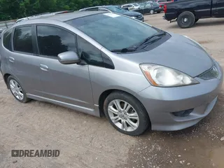 2009 Honda Fit Sport z VIN JHMGE88649C007759, wystawiony jako IAAI lot #42272508 z przebiegiem 182 637 mil mil oraz . Historia ofert i sprzedaży dostępna na DreamBid. Obrazek 1.