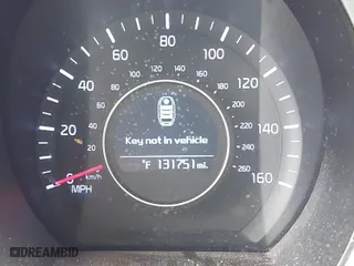 2014 Kia Optima EX with VIN 5XXGN4A76EG281195, listed as a IAAI auction lot 41875540 with 131,751 mi miles. Bid and sale history available at carsss.com. Image 16.