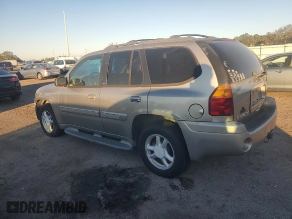 2003 GMC Envoy SLE with VIN 1GKDS13S932170188, listed as a Copart auction lot 82027964 with 266,978 mi miles and Clean Title. Bid and sale history available at carsss.com. Image 2.