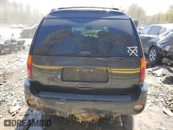 2004 GMC Envoy SLT with VIN 1GKET16S046155005, listed as a Copart auction lot 53554505 with 184,039 mi miles and Salvage Title. Bid and sale history available at DreamBid. Image 6.