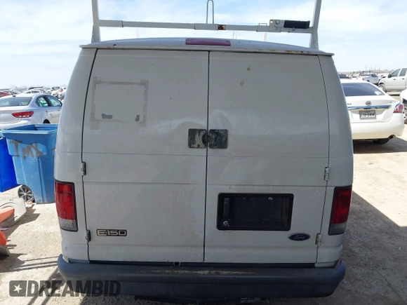 2004 Ford Econoline Cargo with VIN 1FTRE14W44HA29084, listed as a IAAI auction lot 41793350 with 123,429 mi miles. Bid and sale history available at carsss.com. Image 16.