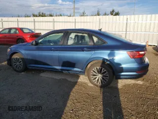 2021 Volkswagen Jetta SEL z VIN 3VWE57BUXMM015072, wystawiony jako Copart lot #72251204 z przebiegiem 126 772 mil mil oraz Szkoda całkowita • Salvage title. Historia ofert i sprzedaży dostępna na DreamBid. Obrazek 2.