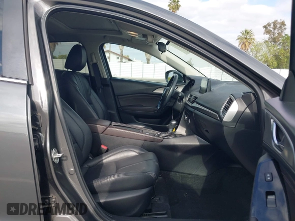 2018 Mazda 3 Touring with VIN 3MZBN1L32JM268582, listed as a IAAI auction lot 42072435 with 61,417 mi miles. Bid and sale history available at carsss.com. Image 5.