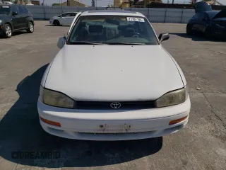 1992 Toyota Camry LE with VIN 4T1SK12E0NU077223, listed as a Copart auction lot 71787194 with 239,027 mi miles and Salvage Title. Bid and sale history available at carsss.com. Image 5.