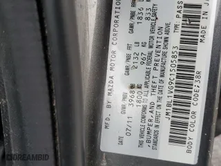 2012 Mazda Mazda3 i Touring with VIN JM1BL1VG9C1505853, listed as a Copart auction lot 77188584 with 0 mi miles and Salvage Title. Bid and sale history available at carsss.com. Image 12.