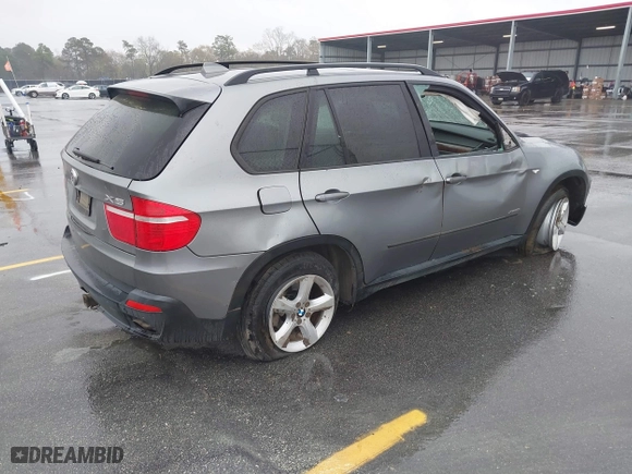 2009 BMW X5 30i with VIN 5UXFE43579L271366, listed as a IAAI auction lot 41831724 with 129,107 mi miles. Bid and sale history available at carsss.com. Image 4.