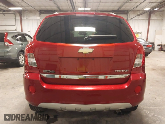 2014 Chevrolet Captiva Sport LT z VIN 3GNAL3EK2ES609279, wystawiony jako IAAI lot #42135344 z przebiegiem 46 330 mil mil oraz . Historia ofert i sprzedaży dostępna na DreamBid. Obrazek 17.
