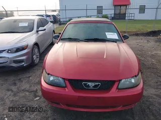 2004 Ford Mustang Deluxe with VIN 1FAFP44604F212319, listed as a IAAI auction lot 42100591 with 191,992 mi miles. Bid and sale history available at carsss.com. Image 16.