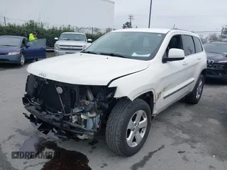 2011 Jeep Grand Cherokee Laredo with VIN 1J4RS4GG2BC709861, listed as a IAAI auction lot 41570812 with 178,226 mi miles and . Bid and sale history available at DreamBid. Image 2.