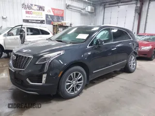 2023 Cadillac XT5 AWD Premium Luxury with VIN 1GYKNDRS2PZ122350, listed as a IAAI auction lot 42123718 with 17,971 mi miles and . Bid and sale history available at DreamBid. Image 18.