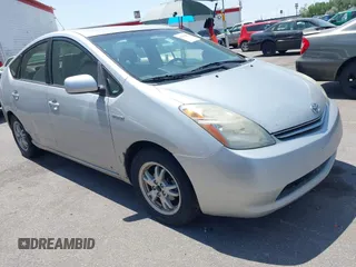 2007 Toyota Prius z VIN JTDKB20U677689240, wystawiony jako IAAI lot #42350481 z przebiegiem 255 628 mil mil oraz . Historia ofert i sprzedaży dostępna na DreamBid. Obrazek 1.