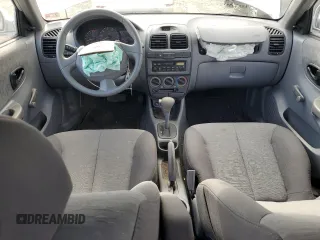 2005 Hyundai Accent GLS with VIN KMHCG45C05U618580, listed as a Copart auction lot 79239064 with 54,228 mi miles and Salvage Title. Bid and sale history available at carsss.com. Image 8.