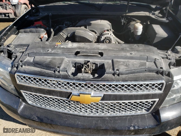 2014 Chevrolet Suburban LT with VIN 1GNSKJE73ER246291, listed as a Copart auction lot 74231304 with 140,688 mi miles and Salvage Title. Bid and sale history available at carsss.com. Image 24.